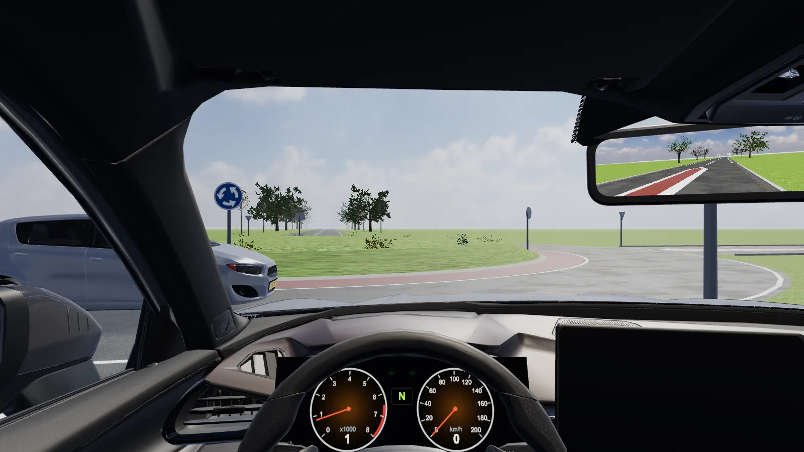 Beeld uit de les “Rotonde buiten de kom” in de rijlessimulator.